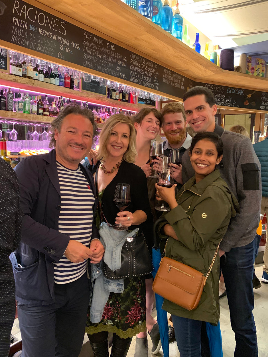 *Happy wine travellers exploring the pintxos bars of San Sebastian and saving wine labels along the way