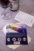 Cargar la imagen en la vista de la galería, Contents of 50 Pack of Treasured Wine - Wine Bottle Label Remover Kit with leaflet and wine label remover sheets and Tips & Tricks, how to remove wine labels,  next to wine glass and wine bottle featuring Tinto de Rulo Pipeno wine from Chile wine region
