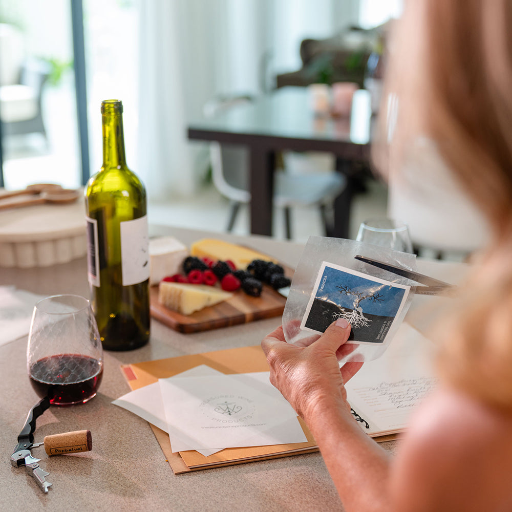 How to Remove Wine Bottle Labels using Treasured Wine - Wine Bottle Label Removers - Shows four easy steps, after removing label, cut around the edge of the label leaving a border of adhesive to instantly place into wine journal, wine menu, wine card or cellar journal